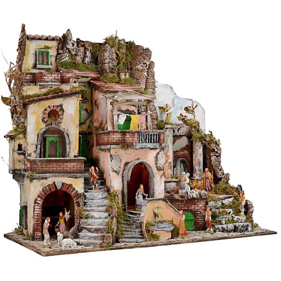 Presepe illuminato con fontana e fuoco funzionante completo di