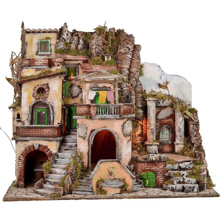 Illuminated nativity scene with functioning fountain and fire