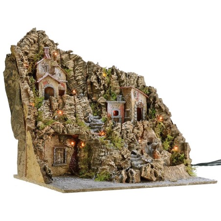 Illuminated nativity scene with functioning oven and waterfall