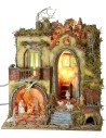 18th century style illuminated nativity scene with large arch
