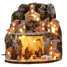 Illuminated snow-covered nativity scene complete with Landi 2