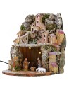 Illuminated snow-covered nativity scene complete with Landi