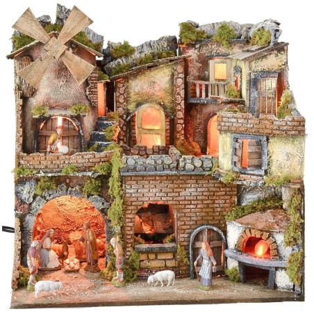 Illuminated Neapolitan nativity scene with oven, waterfall and