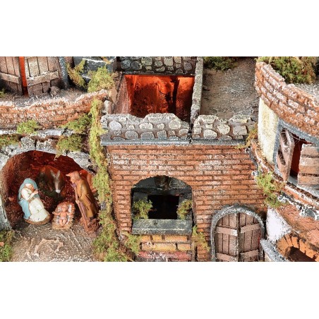 Presepe napoletano illuminato con forno, cascata e mulino a
