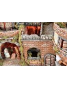 Illuminated Neapolitan nativity scene with oven, waterfall and