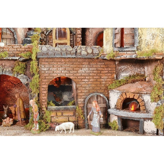 Presepe napoletano illuminato con forno, cascata e mulino a