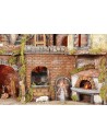 Illuminated Neapolitan nativity scene with oven, waterfall and