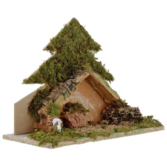 Tree with light-illuminated hut with piles of batteries cm
