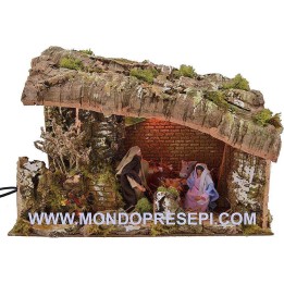 Cabaña del belén con natividad en movimiento