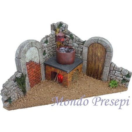 Cocina con caldero efecto ebullición y fuego belén y linterna