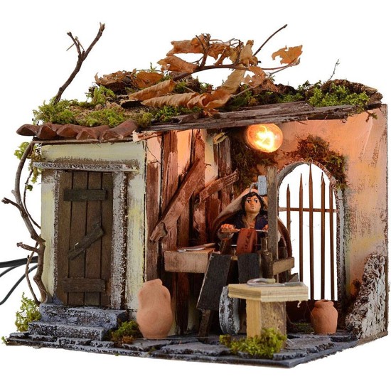 Afilador palestino en movimiento de 10 cm con luz, medidas 20x18x17 cm de alto.