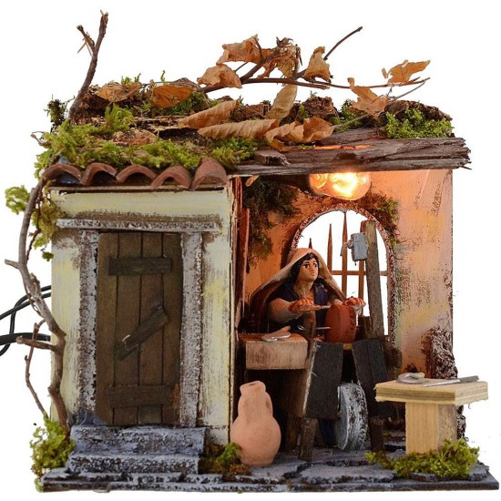 Arrotino palestinese in movimento 10 cm con luce cm 20x18x17 h.