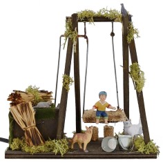 Bambino su altalena in movimento serie 10 cm Mondo Presepi