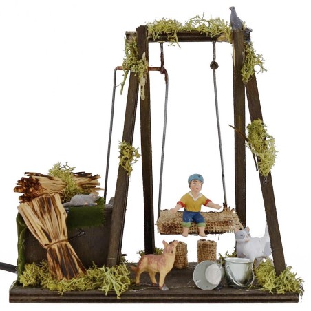 Niño en columpio en movimiento serie 10 cm