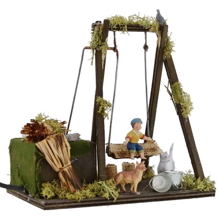 Bambino su altalena in movimento serie 10 cm Mondo Presepi