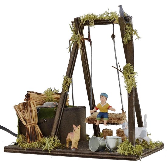 Bambino su altalena in movimento serie 10 cm Mondo Presepi