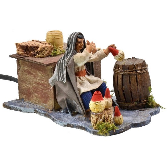 Oriental drinker seated in motion series 12 cm