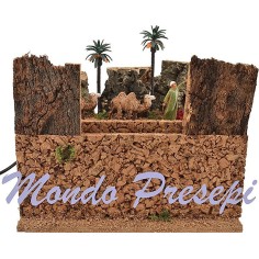 Camel driver with camels on the way