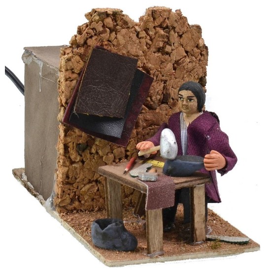 Zapatero sentado en movimiento serie 10 cm Mundo Pesebres