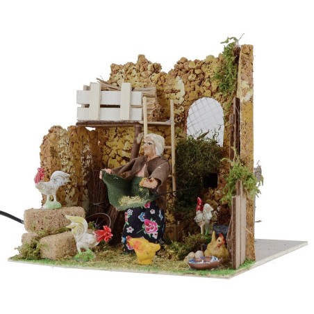 Contadina che ciba le galline in movimento 10 cm Mondo Presepi