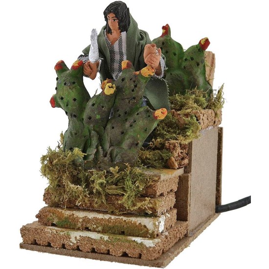 Contadino che taglia i fichi in movimento Mondo Presepi