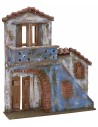 Fachada de casa con escalera y balcón de 33x8,5x38 cm de altura