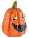 Pumpkin with battery-powered illuminated eyes for Halloween