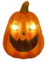 Pumpkin with battery-powered illuminated eyes for Halloween