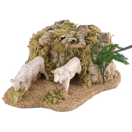 Two moving sheep for statues measuring 14-15 cm eating grass
