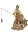 Pescador sobre la roca en movimiento 19 cm Fontanini