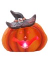 Pumpkin with hat and battery-operated color-changing LED for