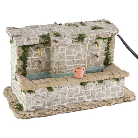 Lavadero de piedra con 2 grifos y cubos a altura