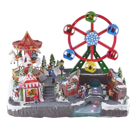 Parque de atracciones navideño con música e iluminación