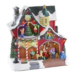 Escenario navideño con casita y carrusel completo con música e