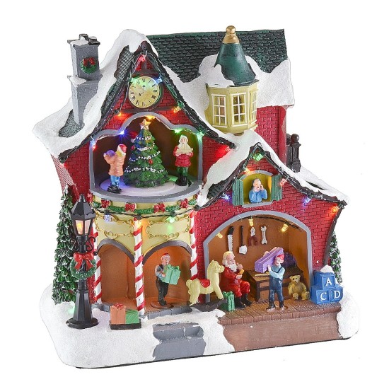 Escenario navideño con casita y carrusel completo con música e
