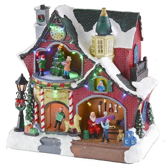 Escenario navideño con casita y carrusel completo con música e