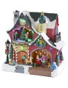 Christmas scenario with little house and carousel complete with