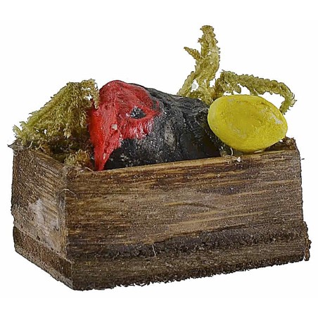 Caja de madera con pez espada de 3x2,1x1,4 cm de alto.