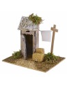 Setting with latrine and wooden drying rack for nativity scene