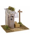 Setting with latrine and wooden drying rack for nativity scene