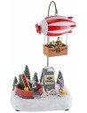 Escenario navideño con dirigible a pilas completo de música e