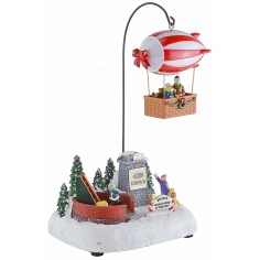 Christmas scenario with battery-operated airship complete with 2