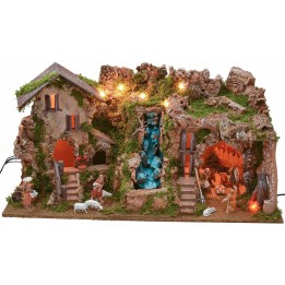 Illuminated nativity scene with grotto, waterfall, and complete fire