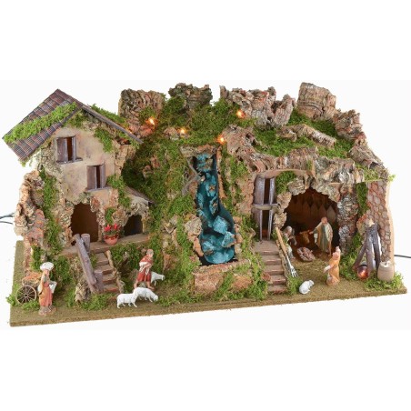 Presepe illuminato con grotta, cascata e fuoco completo di