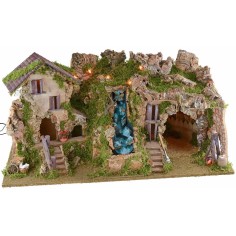 Illuminated nativity scene with cave, waterfall and fire 2