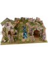 Illuminated nativity scene with cave, waterfall and fire