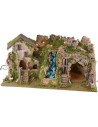 Illuminated nativity scene with cave, waterfall and fire