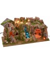 Illuminated nativity scene with cave, waterfall and fire