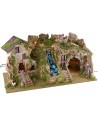 Illuminated nativity scene with cave, waterfall and fire