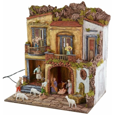 Illuminated nativity scene with working oven and fountain in 18th century style